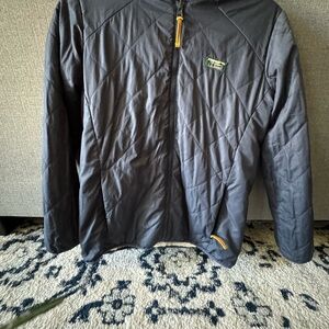 L.L. Bean navy blue quilted reversible light weight winter coat. Fleece lining.